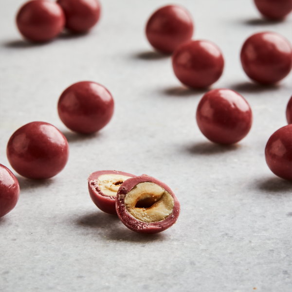 Hazelnuts Dragee covered with ruby Chocolate